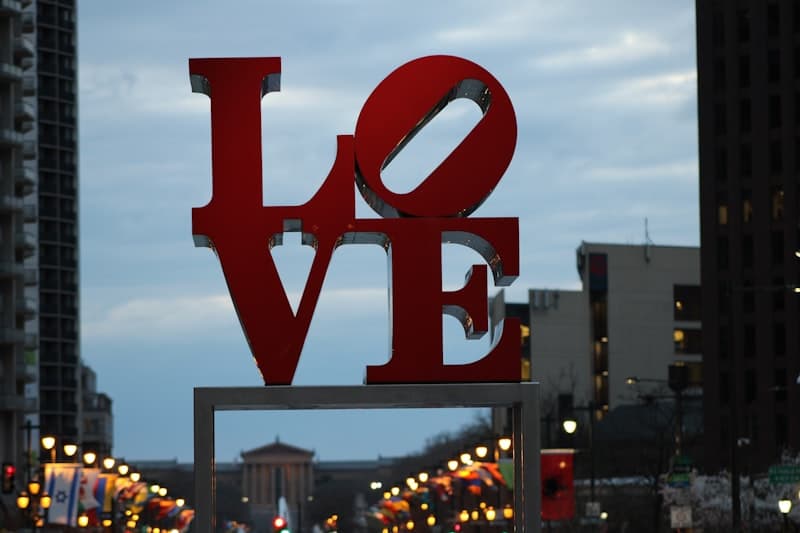 Robert Indiana's red LOVE sculpture at LOVE Park with the Benjamin Franklin Parkway beyond