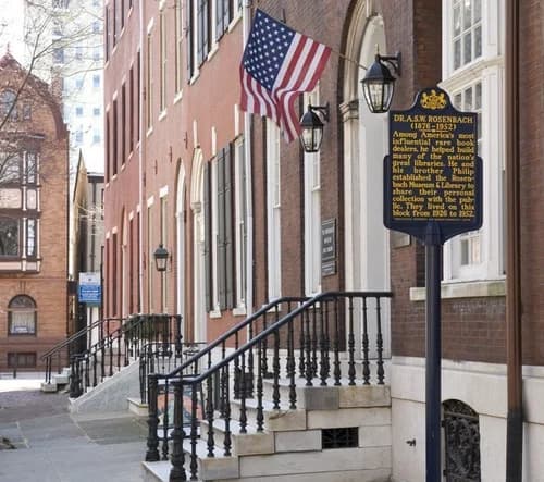 Delancey Place brownstones and the historical marker outside the Rosenbach Museum and Library
